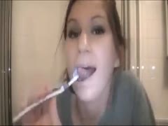 While brushing her teeth, the nastiest woman toys with her pointer sisters.